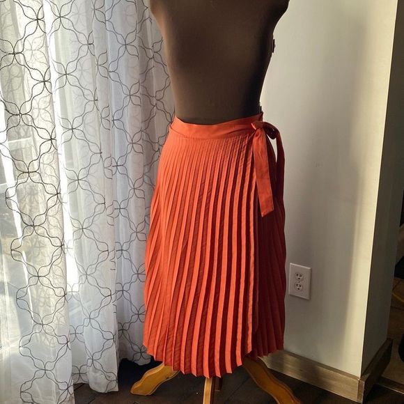 Express Dresses & Skirts - Womens burnt orange pleated wrap skirt Express size small NWOT